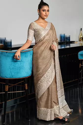 Beige linen blend saree with zari border