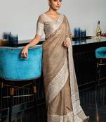 Beige linen blend saree with zari border