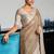 Beige linen blend saree with zari border