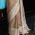 Beige linen blend saree with zari border