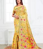 yellow cotton blend floral printed saree