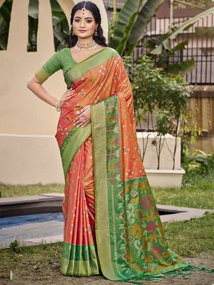 Orange silk blend saree with contrast woven zari border 1