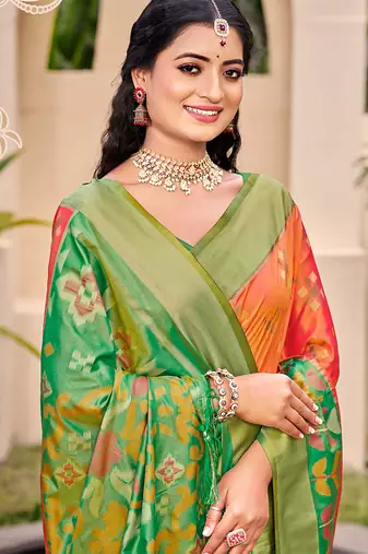 Orange silk blend saree with contrast woven zari border