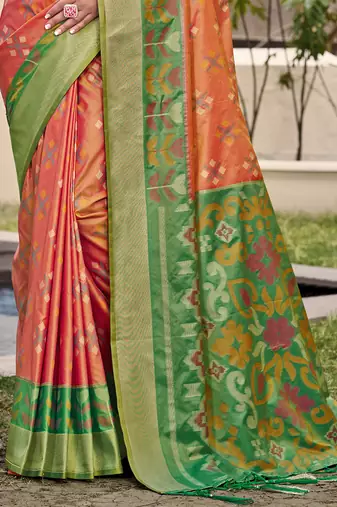 Orange silk blend saree with contrast woven zari border