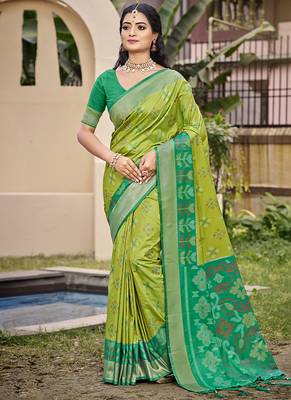 Light green silk blend saree with contrast woven zari border 1