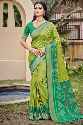 Light green silk blend saree with contrast woven zari border