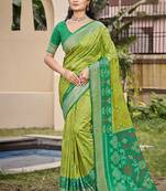 Light green silk blend saree with contrast woven zari border