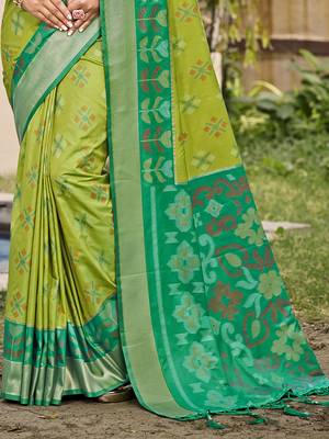 Light green silk blend saree with contrast woven zari border 3