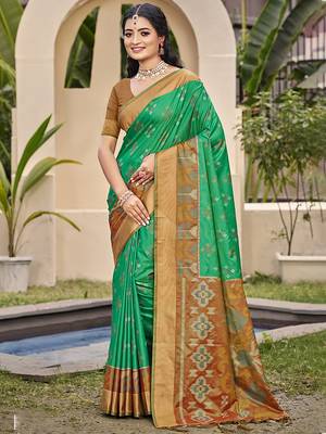 Sea green silk blend saree with contrast woven zari border 1