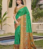 Sea green silk blend saree with contrast woven zari border