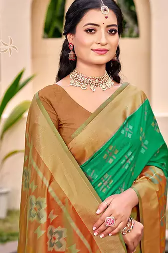 Sea green silk blend saree with contrast woven zari border