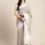 Beige handloom linen saree with floral woven border