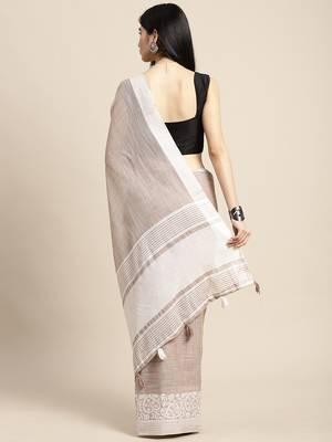 Beige handloom linen saree with floral woven border 2