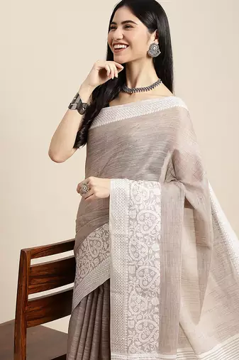 Beige handloom linen saree with floral woven border