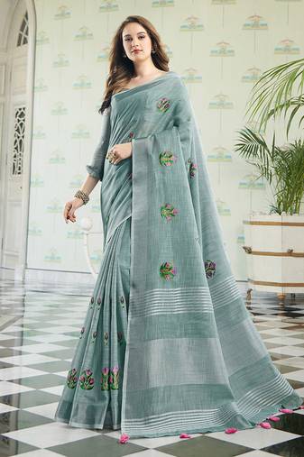 Sea green handloom linen blend saree with floral embroidery