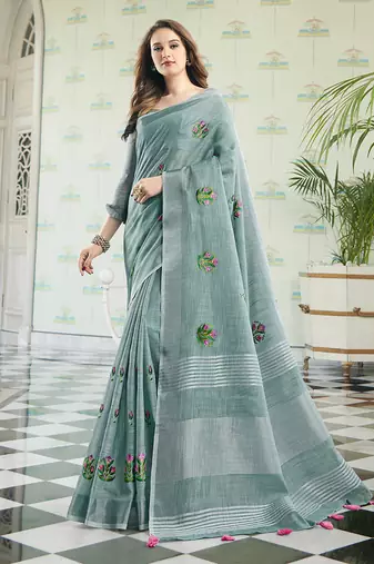 Sea green handloom linen blend saree with floral embroidery