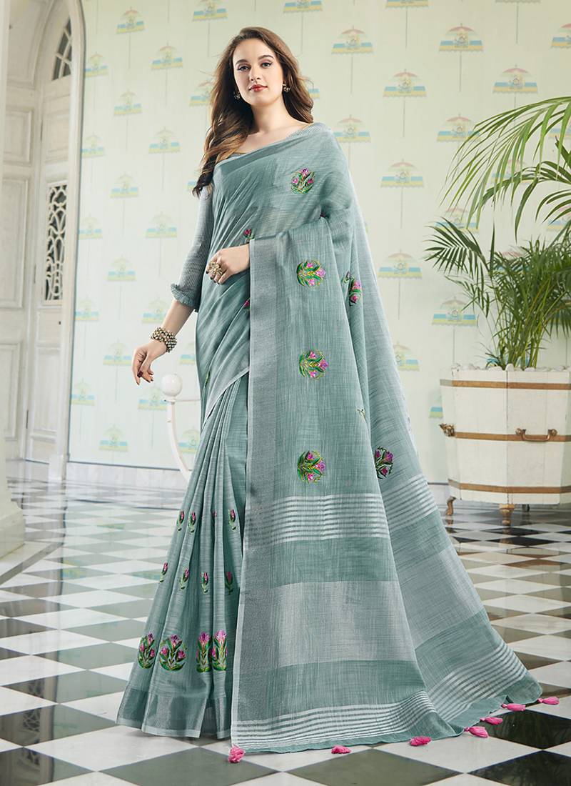Sea green handloom linen blend saree with floral embroidery