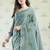 Sea green handloom linen blend saree with floral embroidery