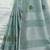 Sea green handloom linen blend saree with floral embroidery
