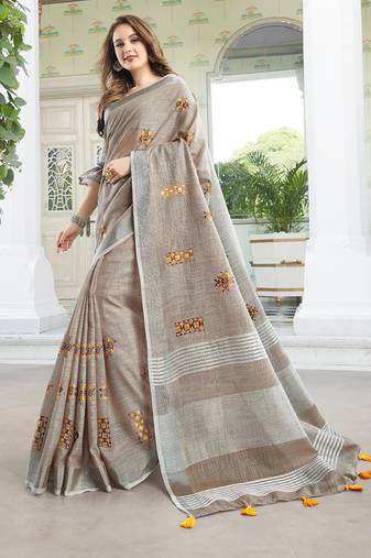 Light beige handloom linen blend saree with floral embroidery
