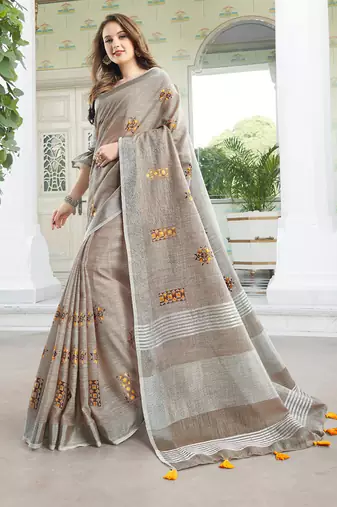 Light beige handloom linen blend saree with floral embroidery