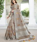 Light beige handloom linen blend saree with floral embroidery