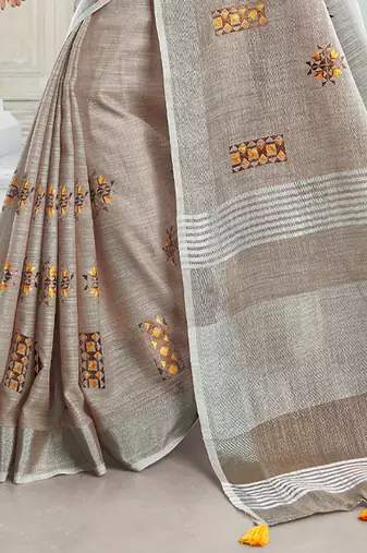 Light beige handloom linen blend saree with floral embroidery