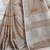 Light beige handloom linen blend saree with floral embroidery