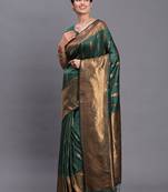 Dark green silk blend saree with zari border and pallu