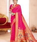 Rani pink paithani silk blend saree with peacock motif pallu