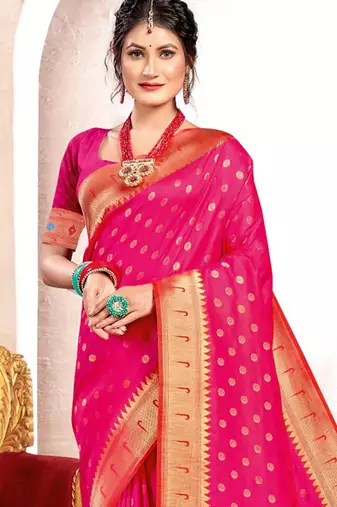 Rani pink paithani silk blend saree with peacock motif pallu