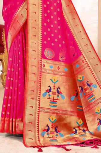 Rani pink paithani silk blend saree with peacock motif pallu