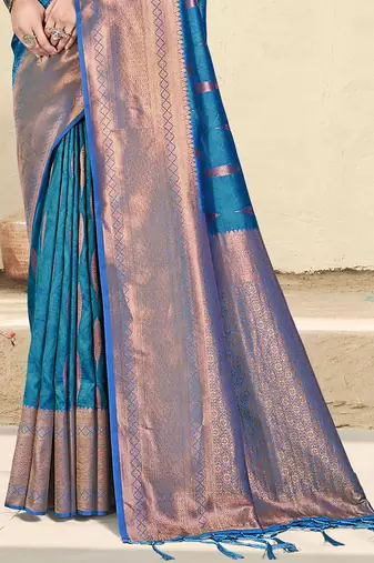Teal blue silk blend saree with zari border and pallu