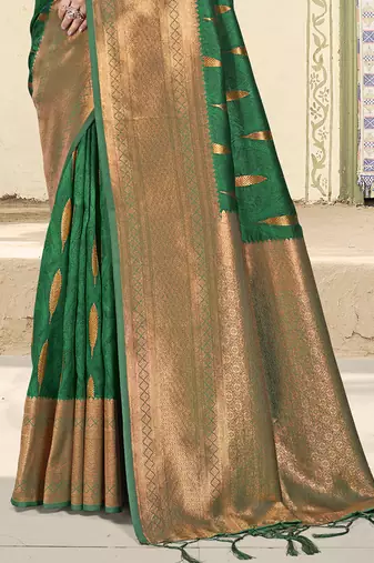 Bottle green silk blend saree with zari border and pallu