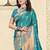 Turquoise silk blend saree with zari border and pallu