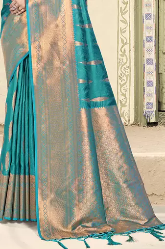 Turquoise silk blend saree with zari border and pallu