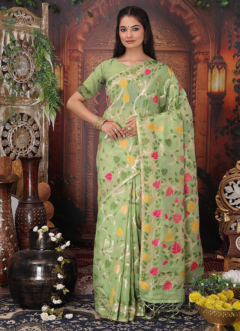 light green cotton blend saree with colorful woven floral motifs