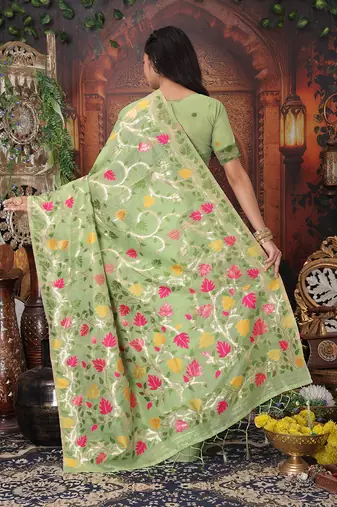 light green cotton blend saree with colorful woven floral motifs