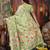light green cotton blend saree with colorful woven floral motifs