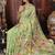 light green cotton blend saree with colorful woven floral motifs