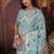 sky blue cotton blend saree with colorful woven floral motifs