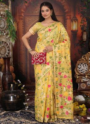 yellow cotton blend saree with colorful woven floral motifs 3