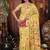 yellow cotton blend saree with colorful woven floral motifs