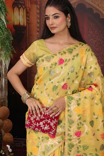 yellow cotton blend saree with colorful woven floral motifs