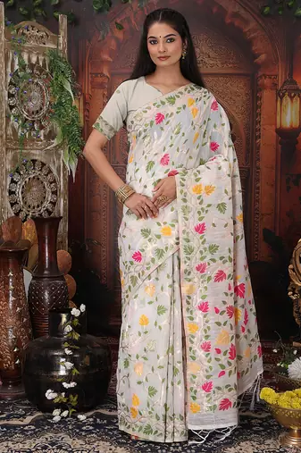 white cotton blend saree with colorful woven floral motifs