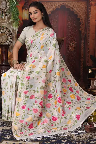 white cotton blend saree with colorful woven floral motifs
