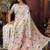 white cotton blend saree with colorful woven floral motifs