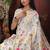 white cotton blend saree with colorful woven floral motifs