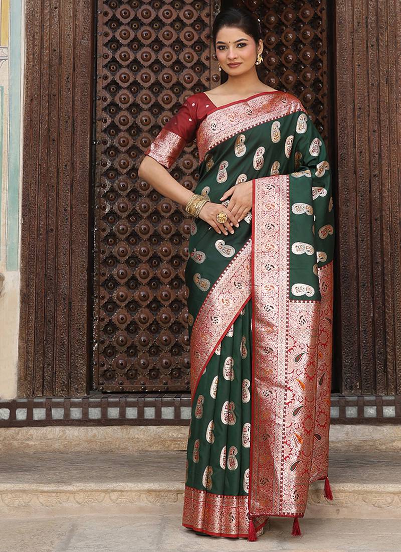 Bottle green silk blend woven saree with paisley motifs