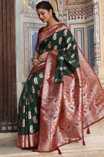 Bottle green silk blend woven saree with paisley motifs